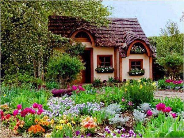 Ένα υπέροχο σπίτι με λουλούδια online παζλ