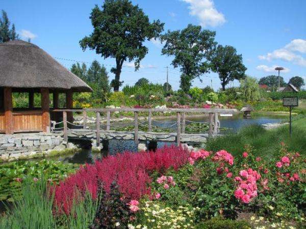 gazebo among flowers and trees jigsaw puzzle online