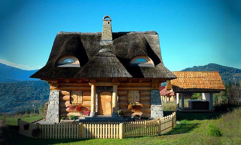Cottage con tetti di paglia puzzle online