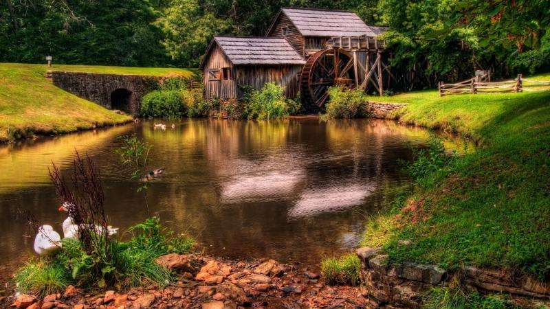 alte Mühle am Fluss Puzzlespiel online