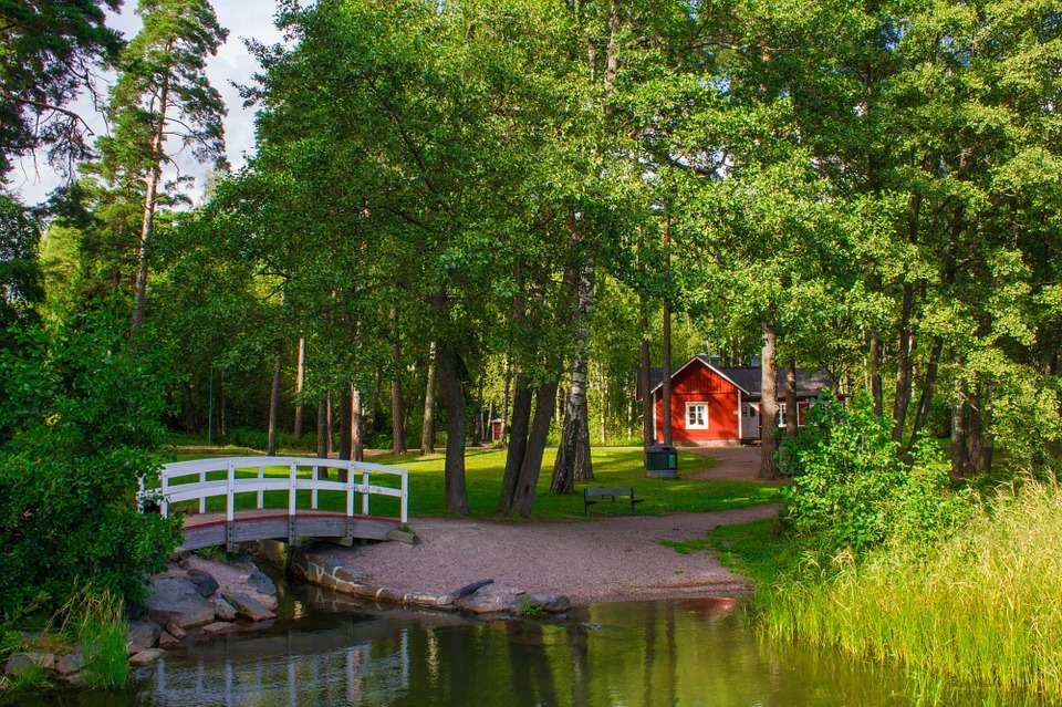 A red house in the forest. jigsaw puzzle online