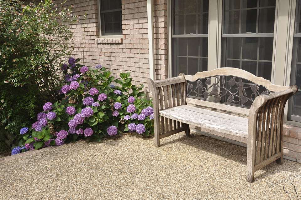 Bench in front of the house. jigsaw puzzle online