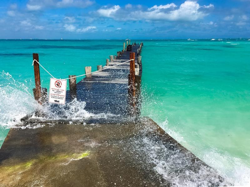Pier flooded with waves. online puzzle