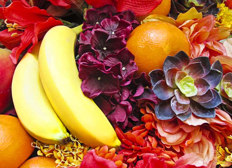 Flores, plátanos, naranjas. rompecabezas en línea