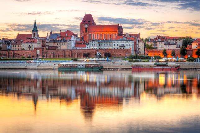 Toruń au coucher du soleil puzzle en ligne