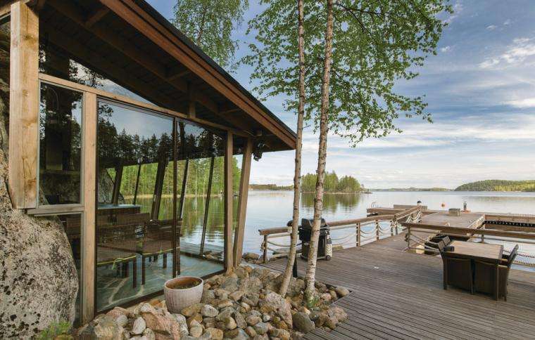 Uma casa à beira do lago. puzzle online