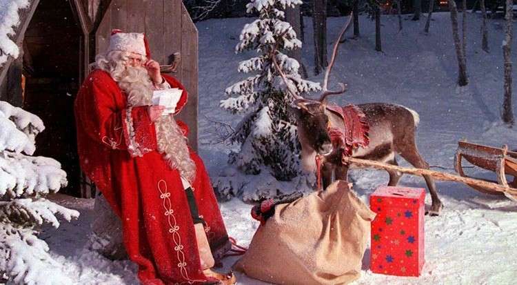 Санта с оленями пазл онлайн