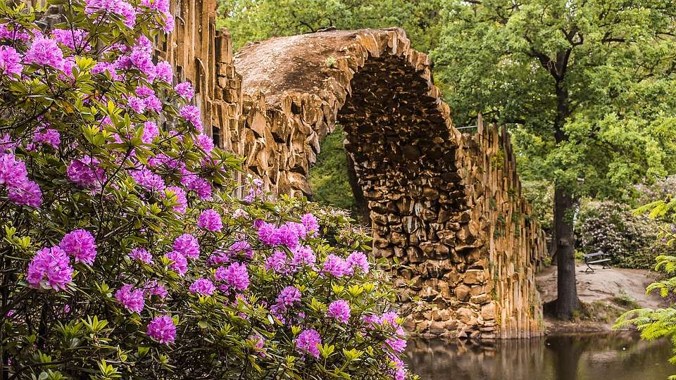 A stone bridge over a small ri jigsaw puzzle online