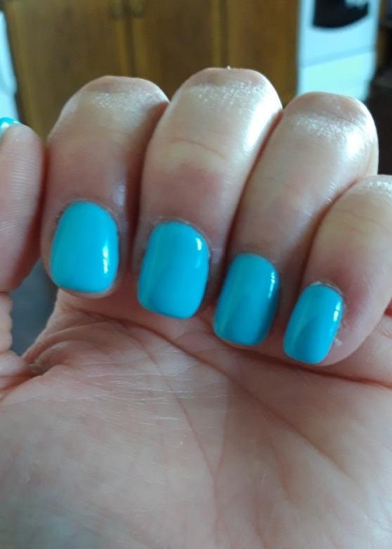 Manikyr, blå naglar. Pussel online