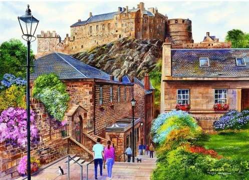 Un castel care se înalță peste oraș. jigsaw puzzle online