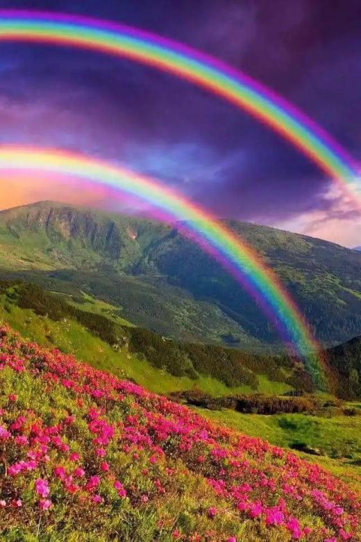 Regenbogen über den Bergen Puzzlespiel online