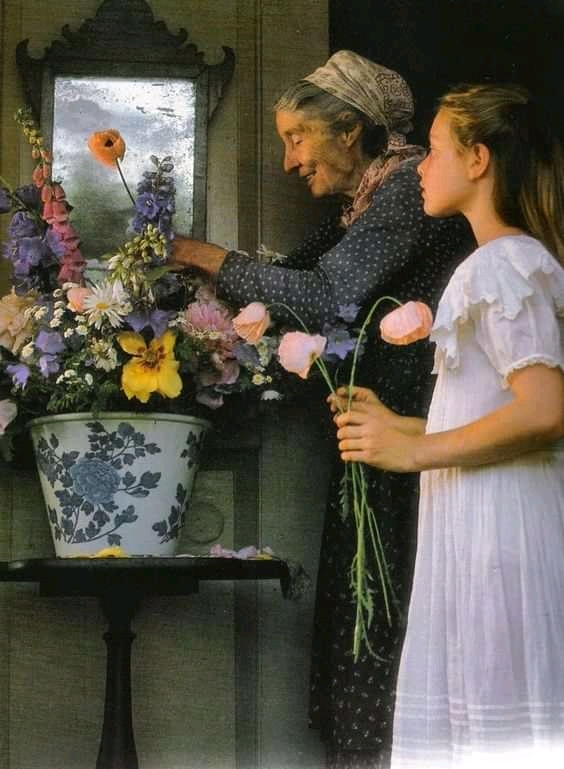 Enkelin mit Großmutter und Blumen Online-Puzzle