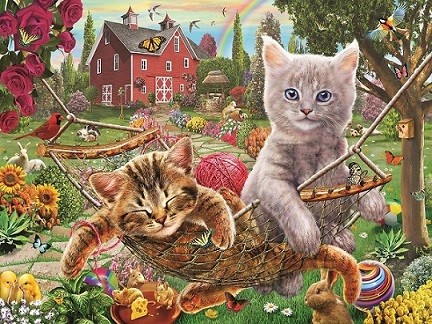 Kätzchen auf einer Hängematte. Online-Puzzle