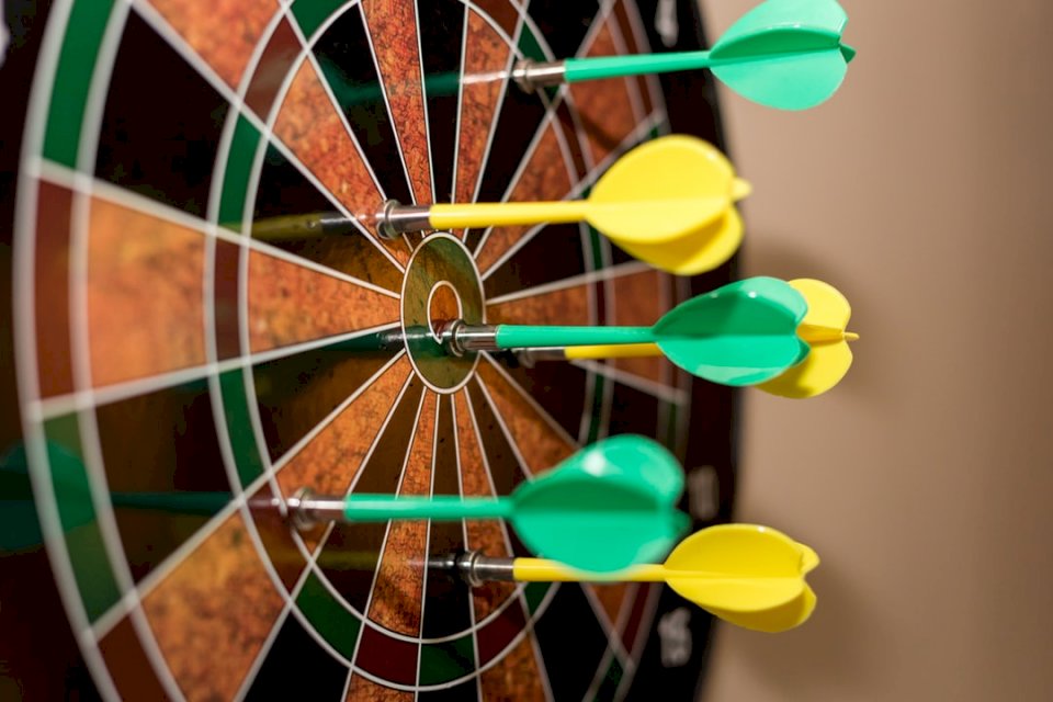 Close up of magnetic darts on jigsaw puzzle online