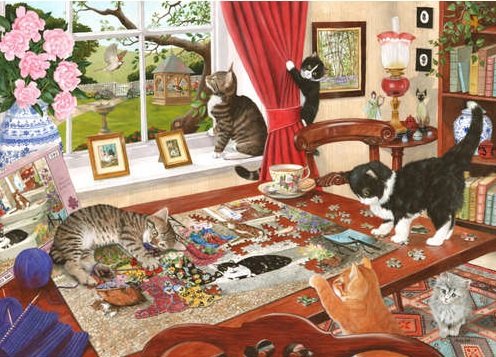 Cats arranging puzzles. jigsaw puzzle online