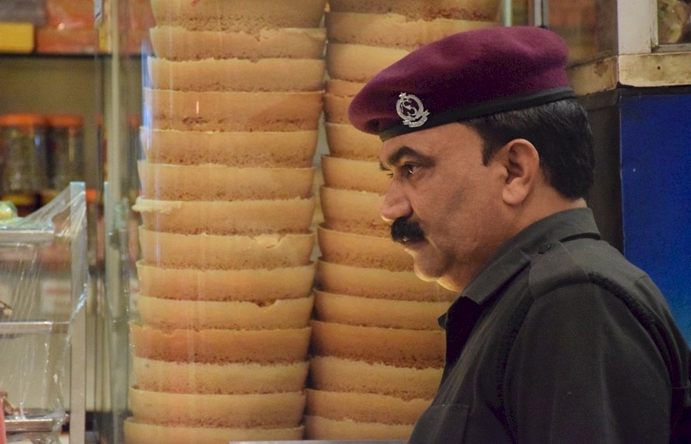 ansikten från Indien, bild av Saddam Hussein Pussel online