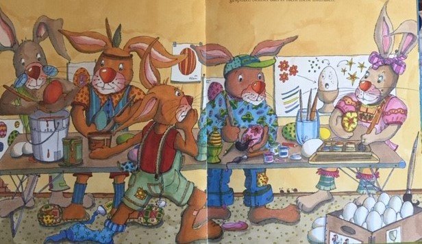 Сім'я кроликів фарбує яйця онлайн пазл