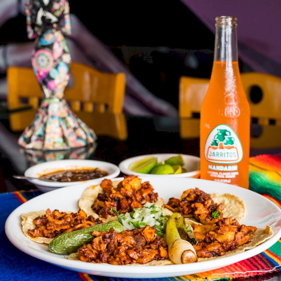 Jarritos Mandarin med Tacos Pussel online