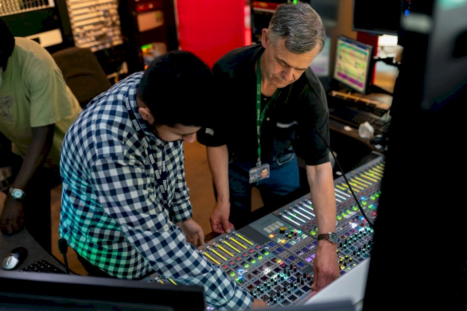 Broadcast engineers work in jigsaw puzzle online