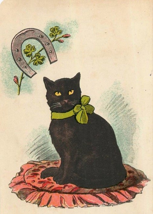 černá kočka a podkova pro štěstí skládačky online
