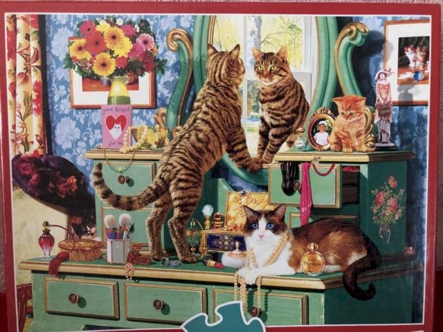 Katze und Spiegel. Puzzlespiel online