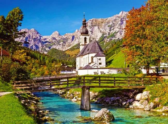 Igreja no rio e ponte nas montanhas puzzle online