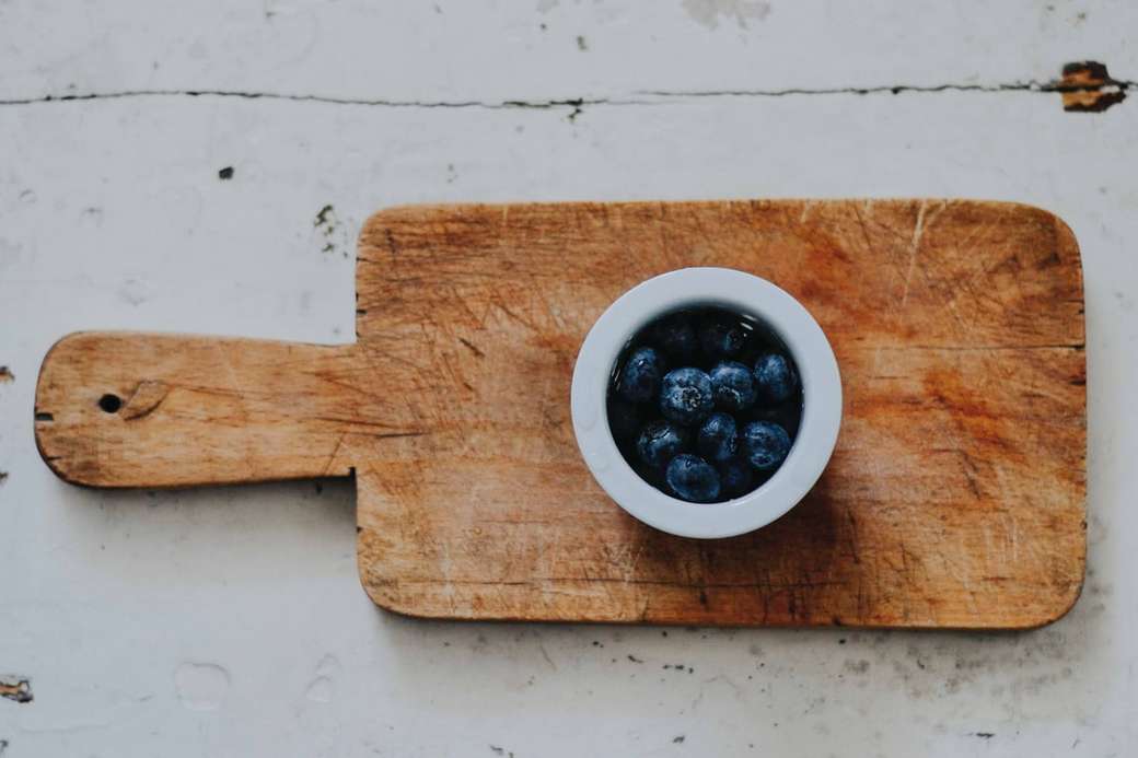 blueberries on white saucer on chopping board online puzzle