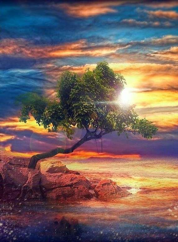 o sol por trás de uma árvore puzzle online