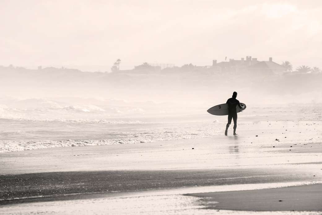 Surfer heading into the mist jigsaw puzzle online