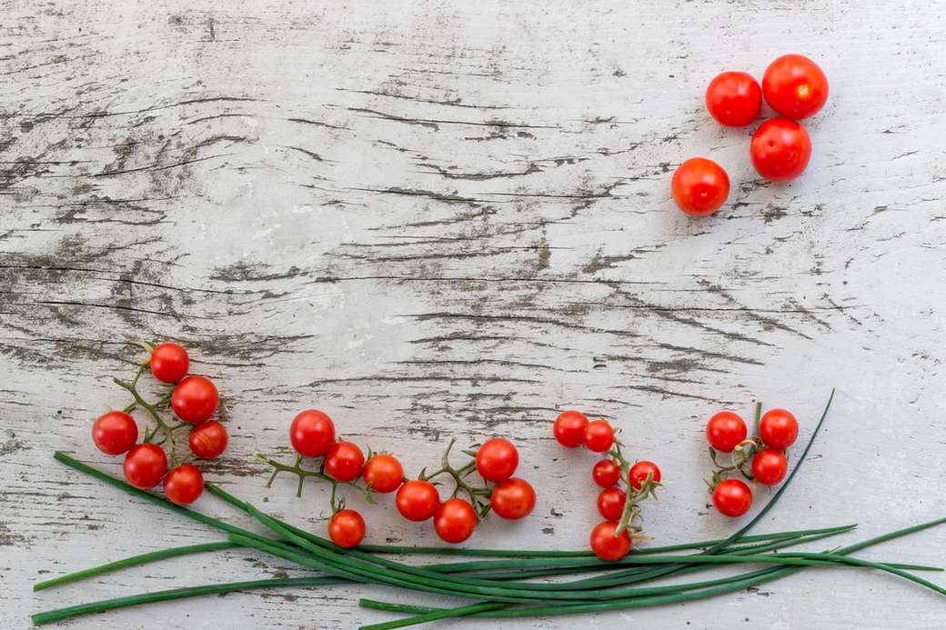 piros citrus bogyós gyümölcsök a szürke felületen online puzzle
