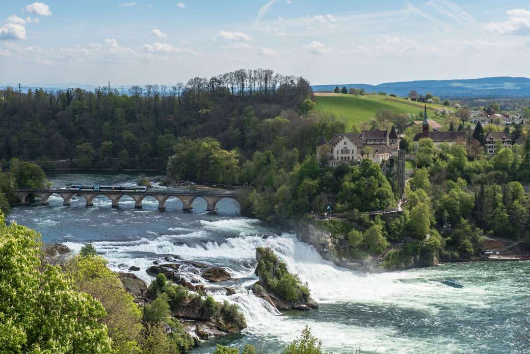 Рейнський водоспад поблизу Шаффхаузена, Швейцарія пазл онлайн