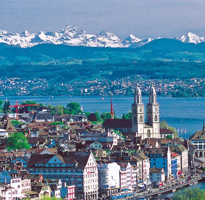 Цюрих с езерото Цюрих и планинска панорама онлайн пъзел
