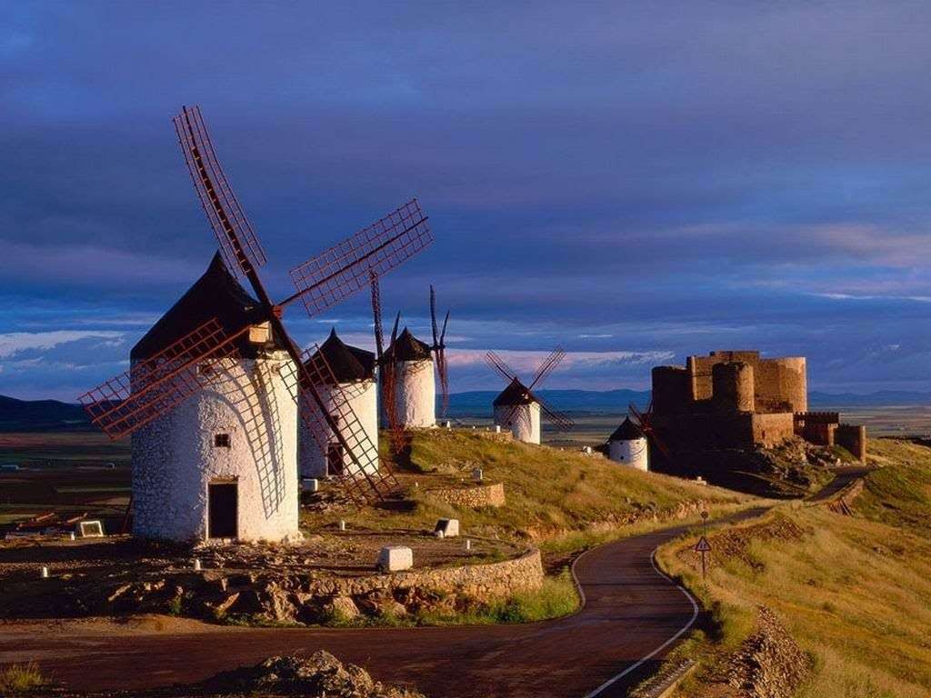L'Espagne avec des moulins à vent et le château de La Muela en arrière-plan. puzzle en ligne
