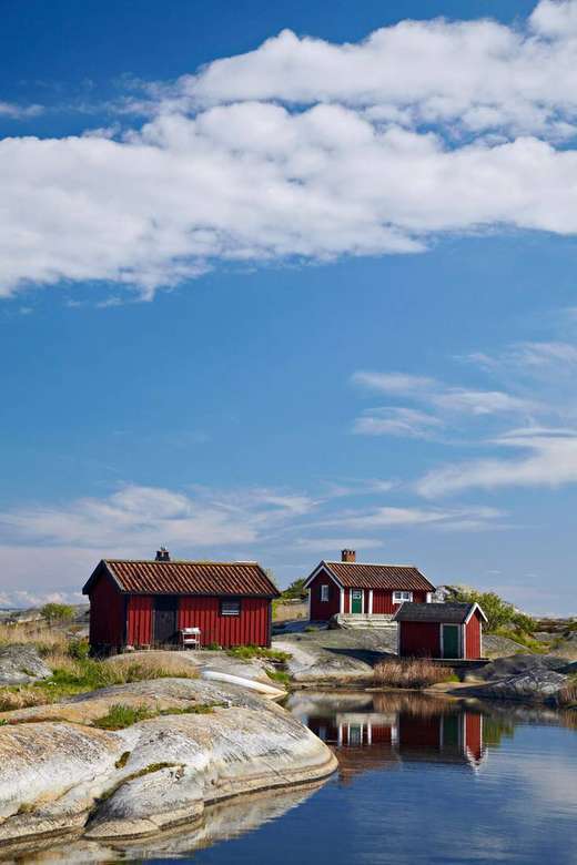 Casas vermelhas na costa da Suécia quebra-cabeças online