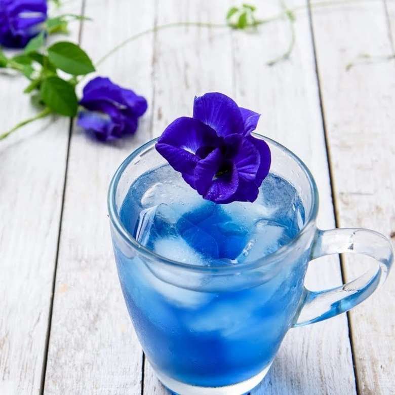 blå blomma te pussel på nätet