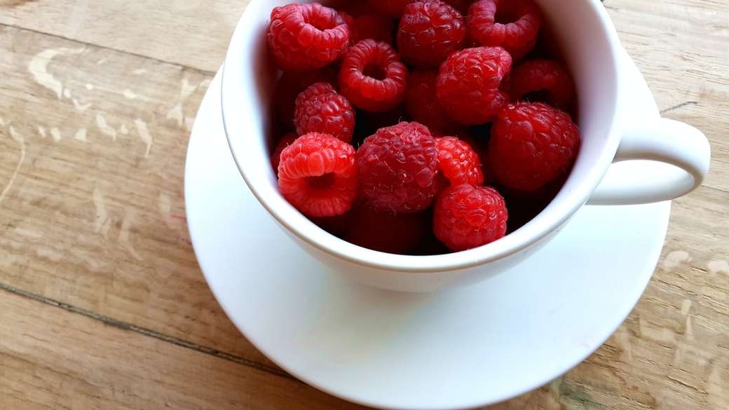 Raspberries in a cup jigsaw puzzle online