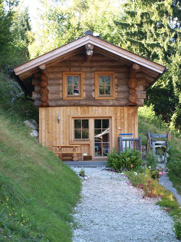 Maison de vacances dans les montagnes suisses puzzle en ligne