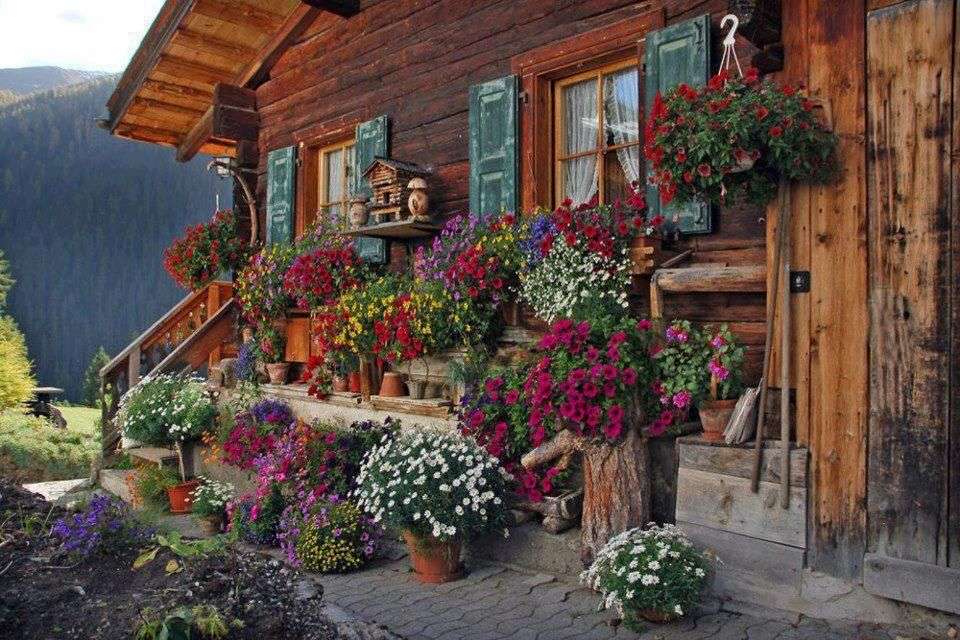 Casa de campo en Austria con decoraciones florales rompecabezas en línea