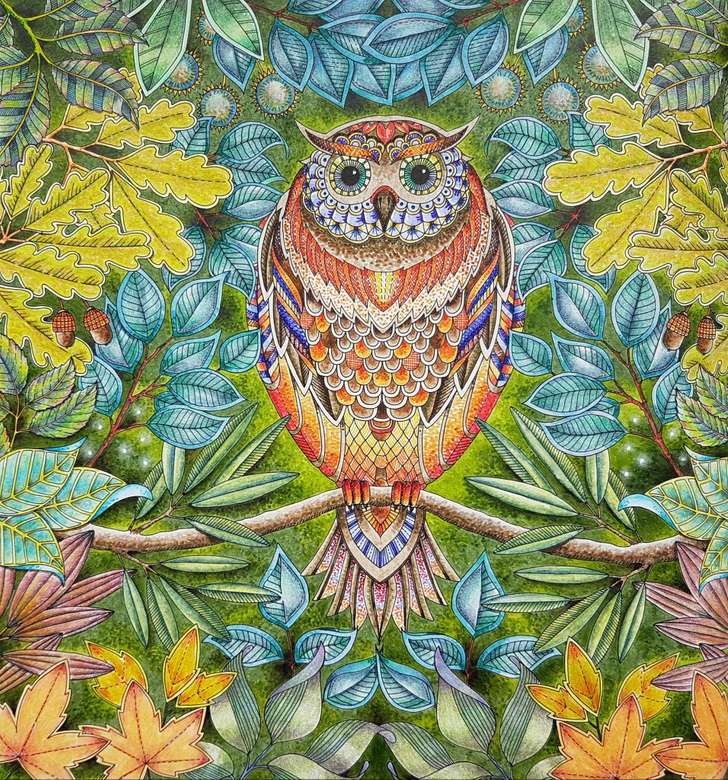 Colorful owl in the thicket of leaves jigsaw puzzle online