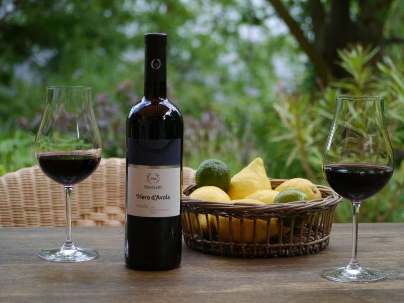 Vino Nero d'Avola och citrusfrukter Sicilien Pussel online
