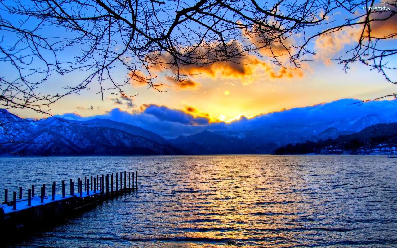 pôr do sol sobre o lago puzzle online