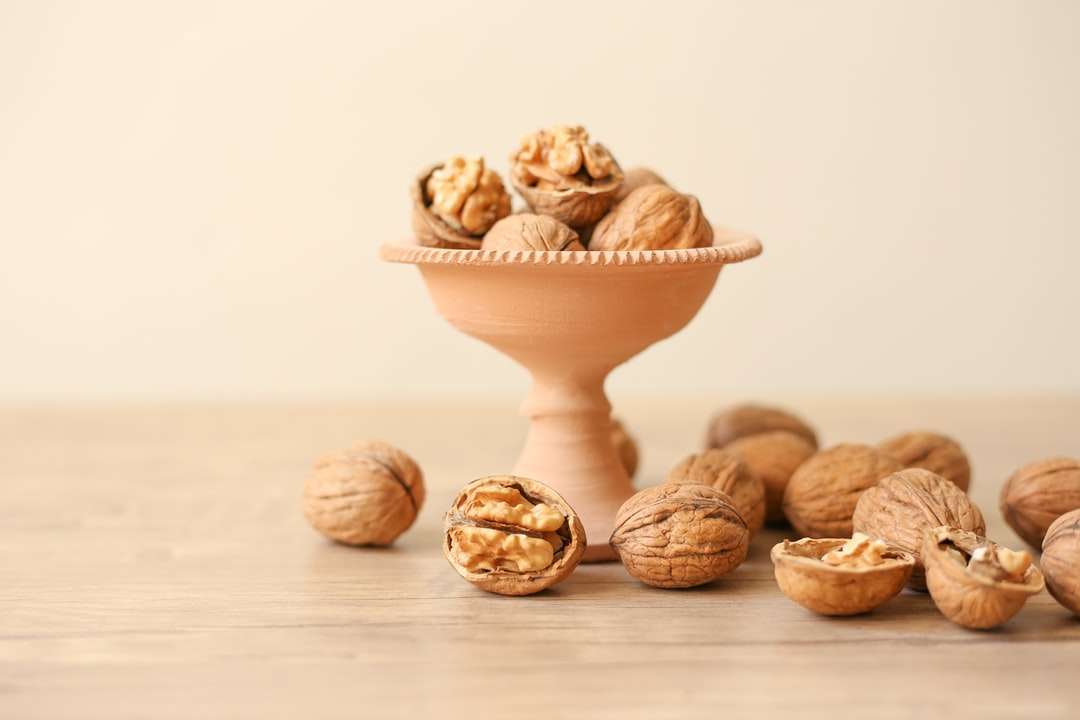 brown and white ceramic bowl with brown cookies jigsaw puzzle online
