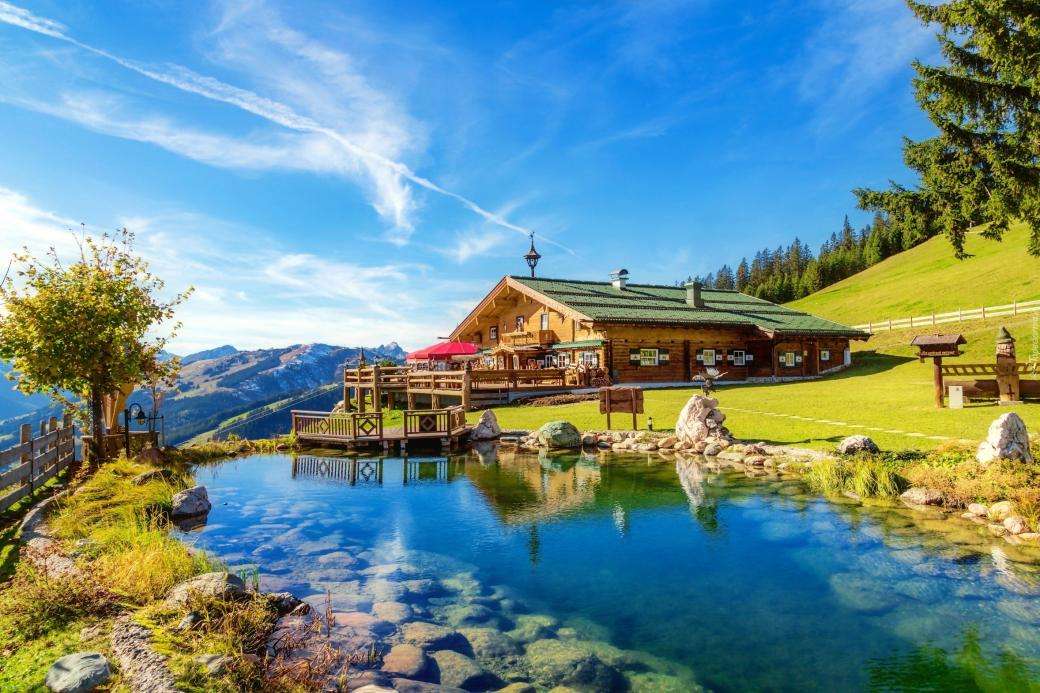 huis in de bergen aan de rivier legpuzzel online