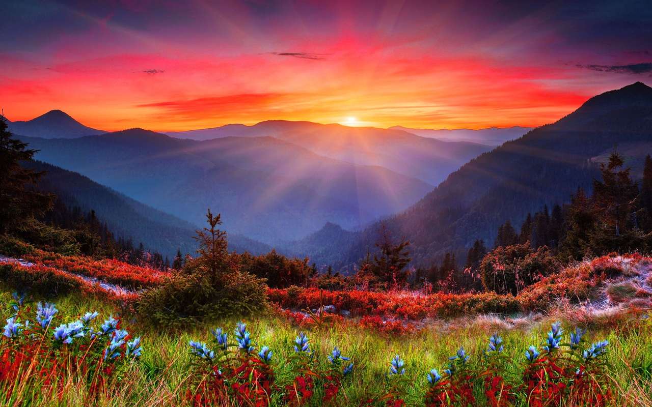 Coucher de soleil dans un paysage de montagne puzzle en ligne