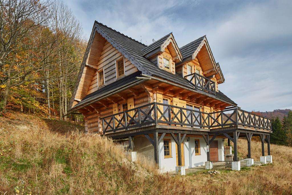 casa de madeira nas montanhas puzzle online