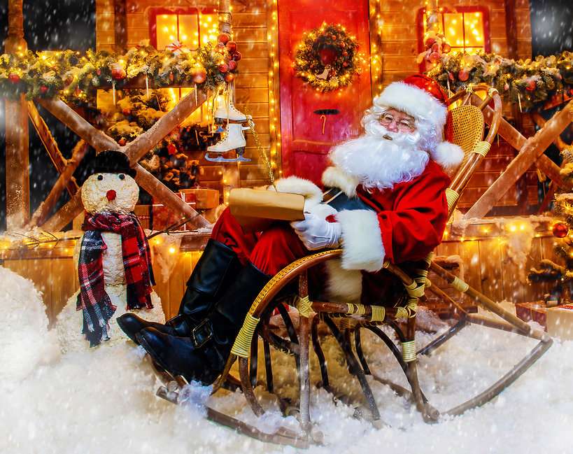Άγιος Βασίλης σε μια κουνιστή καρέκλα παζλ online