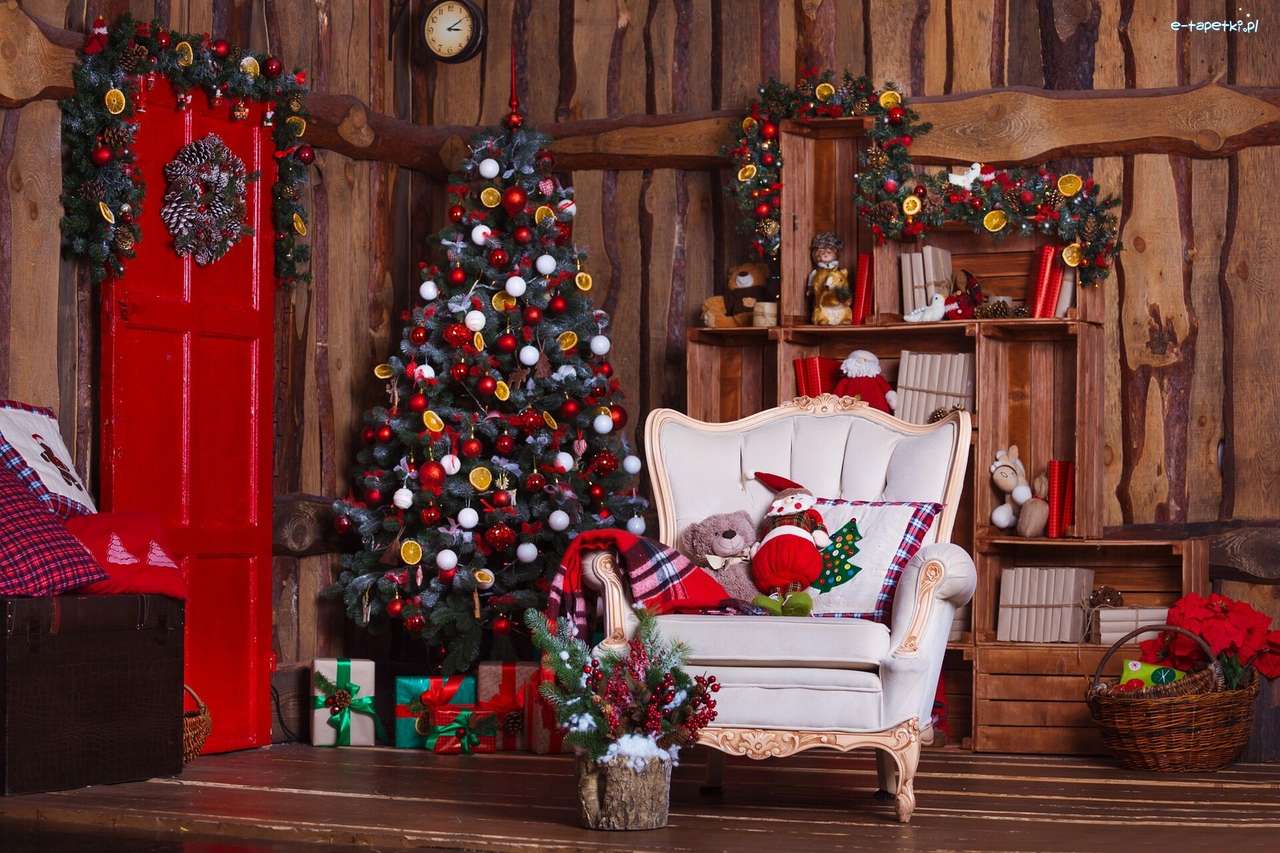 Kerstboom met geschenken in een houten huis legpuzzel online