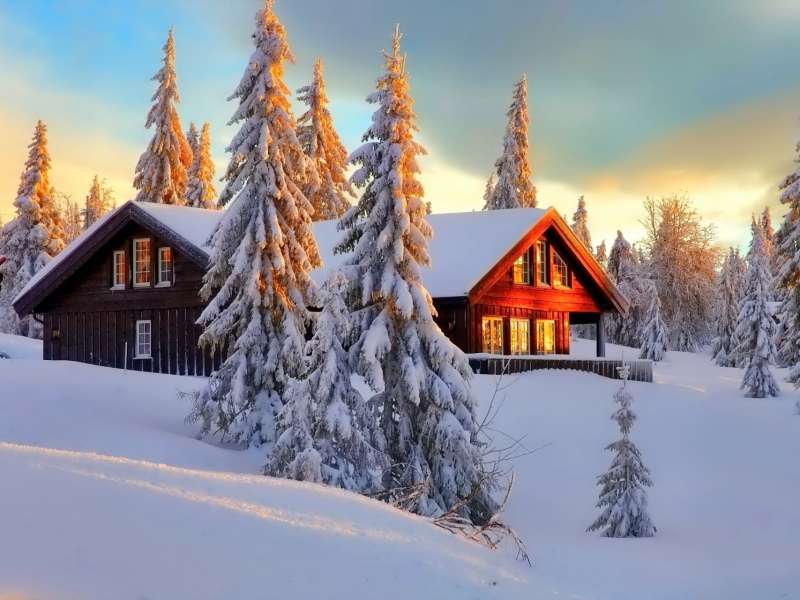 Met sneeuw bedekt huis legpuzzel online