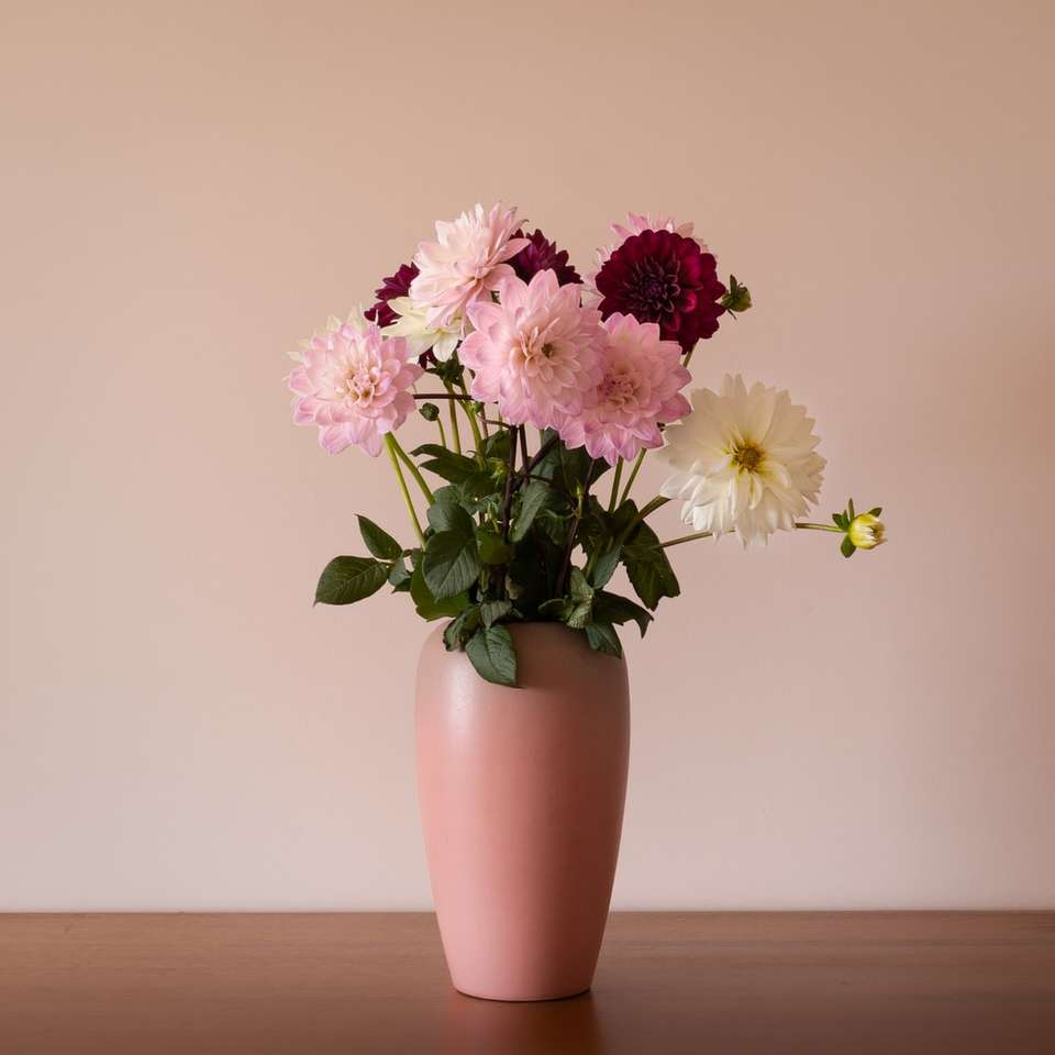 pink and white flowers in brown ceramic vase online puzzle