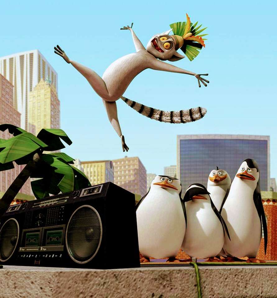 The lemur king Julian and penguins from Madagascar jigsaw puzzle online